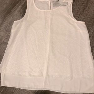 Sleeveless white blouse